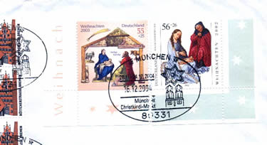 The German stamps stuck in the envelop: "2002 and 2003 Christmas". The postmark is a special "Christmas" mark from Munchen post office on Dec. 16,2004